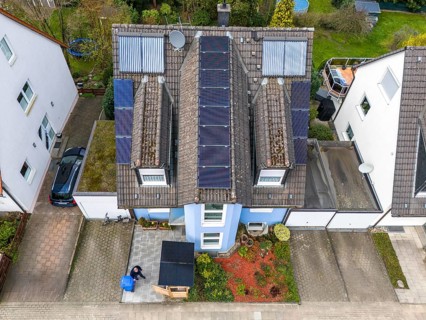 Detached house with various solar modules, in addition to normal standard solar panels, PV tube