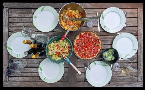 Garden table set with salads and a quiche, Bavaria, Germany, Europe