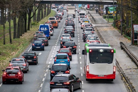 City centre traffic, 3-lane Westfalendamm, federal road B1, dense traffic, city bus public