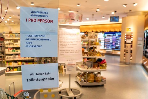 DM drugstore, signs at the entrance, no toilet paper, only one hygiene product per person, effects