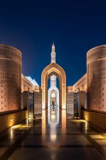 Sultan Qaboos Grand Mosque, illuminated archway with minaret, Muscat, Oman, Asia