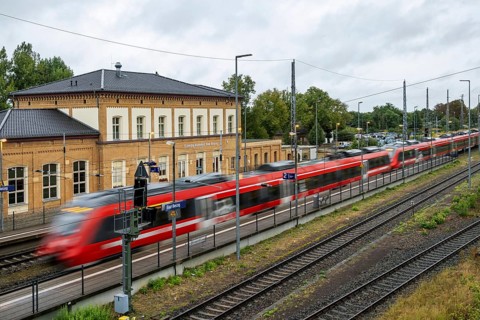 Railway station with station building and regional railway. Bad Belzig, Brandenburg, Germany,