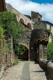 Historic gateway (Porte du Brugelet) leading into the medieval city of Auzon in Haute Loire,