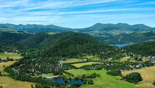 Panoramic view of Lake Chambon and the Sancy massif in the Auvergne Volcanoes Regional Natural