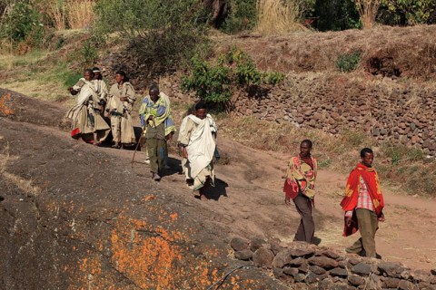 Rock churches in Lalibela, pilgrims on the way to the rock church of St George, Bete Kiddus
