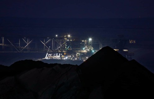 Lignite excavators extract coal in the Welzow open-cast mine, operated by LEAG. The lignite is