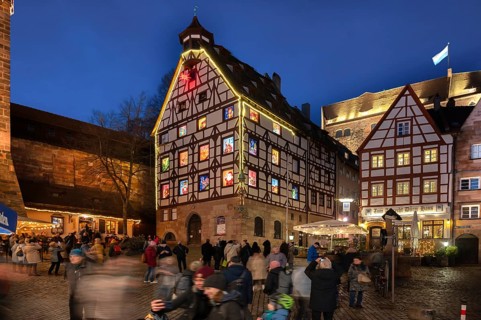 Pilatushaus, built in 1489, a historic town house with an Advent calendar on 18 December 2024 at