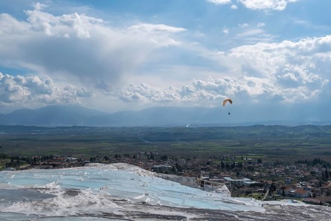Sintered limestone terraces of Pamukkale, tandem paragliding, Pamukkale, Denizli province, Aegean