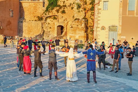 Group of people performing traditional Greek dance, Chania, Crete, Greek Islands, Greece, Europe