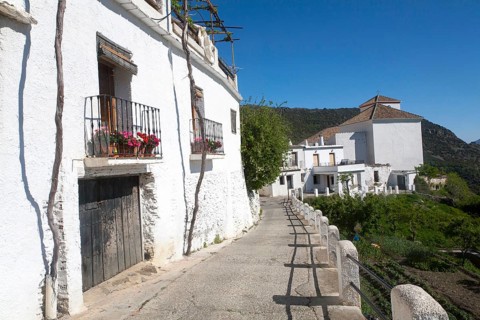 Houses in the village of Bubion, High Alpujarras, Sierra Nevada, Granada province, Spain, Europe