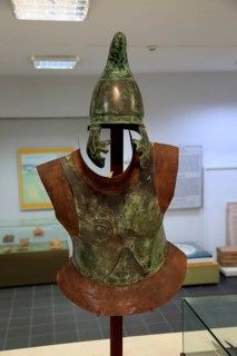 Helmet and armour of a Thracian soldier on display in Kazanlak museum, Bulgaria, Europe