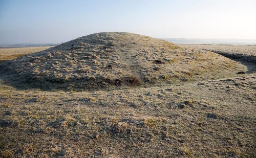 Bronze Age bowl barrow on Windmill Hill, a Neolithic causewayed enclosure, near Avebury, Wiltshire,