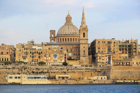 Soft evening light on buildings and churches Valletta, Malta, dome Basilica of Our Lady of Mount