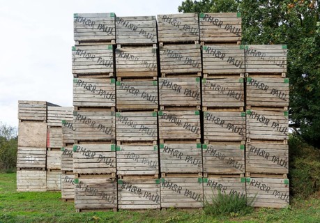 Wooden crates used for potatoes makred with farmer's name, Sutton, Suffolk, England, UK