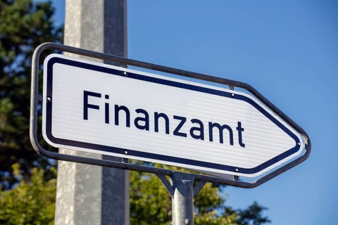 Directional sign with the inscription tax office