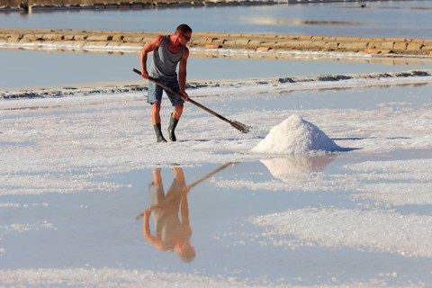 Workers in the salt pans of Trapani, Sicily, Italy, Europe