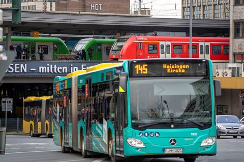 Local transport, junction at the main railway station, local trains, city bus, in the city centre