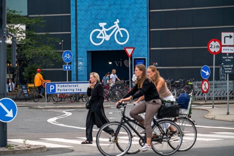 Cyclists on cycle paths, bicycle parking garage at the Fisketorvet shopping centre, Sydhavnen, in