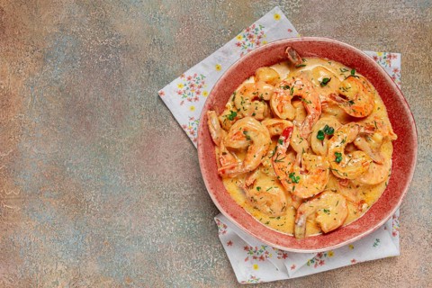 Shrimp in creamy garlic sauce, with spices and herbs