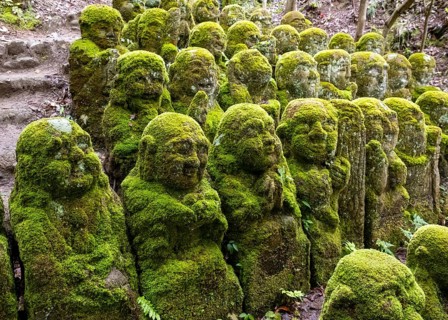 Moss-covered stone statues of rakans, the disciples of Buddha, Otagi Nenbutsu-ji temple, Kyoto,