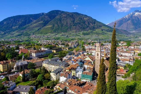 View of the historic centre of Merano with the parish church of the Assumption of the Virgin Mary,