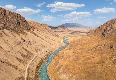 Mountain valley with wild river between hills, Bolgart Valley, Naryn Province, Kyrgyzstan, Asia