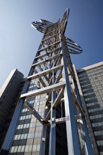 Sculpture by Nicolas Schöffer entitled Chronos 15, light-kinetic tower in front of the Stadthaus,