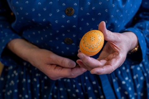Hand holding a decorated Easter egg, Sorbian Easter egg, Germany, Europe