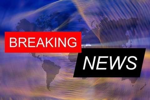 Symbolic image: The words Breaking News on an abstract background
