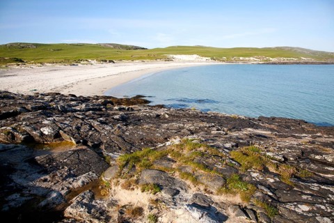 Rocky headland and sandy beach at Bagh a Deas, South Bay, Vatersay island, Barra, Outer Hebrides,