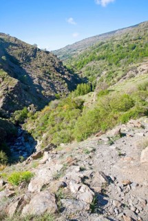 Landscape of the River Rio Poqueira gorge valley, High Alpujarras, Sierra Nevada, Granada Province,