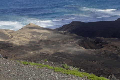 View from the Mirador de Barlovento of volcanic landscape, with the Atlantic Ocean behind,