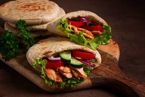 Shawarma in pita bread, chicken, with vegetables, homemade, no people