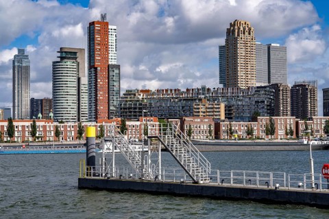 Harbour basin of the Maashaven, inland waterway port, jetties, residential buildings in the Kop van