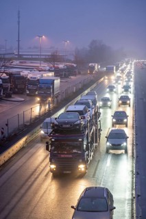 Heavy traffic on the A2 at the Bottrop-Süd service area, overcrowded lorry parking in the evening,