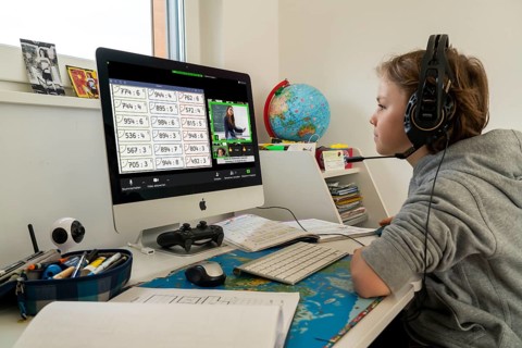 Young, primary school pupils, home learning, doing schoolwork, distance learning, virtual