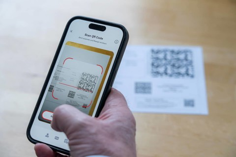 Symbolic image of an e-prescription, prescription issued by a doctor, with QR code, is scanned