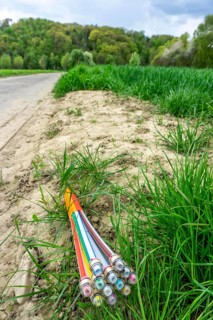 Fibre optic cable, freshly laid along a dirt road, provision of high-speed Internet in rural areas,
