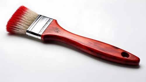 Thick paintbrush dipped in red bristles dripping onto a white background, AI generated