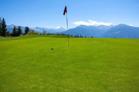 Crans Sur Sierre Golf Course with Hole 7 and Mountain View in Crans Montana in Valais, Switzerland,