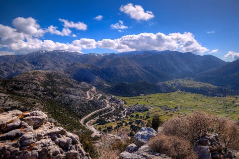 Mountainous landscape with serpentines, meadows and settlements, partially shaded, Askifou plateau,
