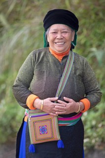Vietnamese woman, 69 years old, from the Hmong minority in everyday clothes, portrait, Bac Sum