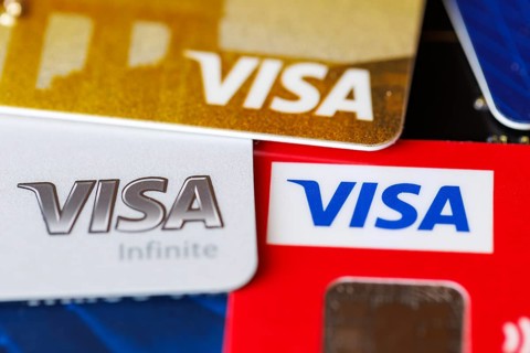 Credit cards from VISA to pay as background in Stuttgart, Germany, Europe