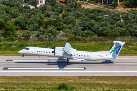 A De Havilland Dash 8 Q400 aircraft of Avanti Air with the registration D-AASH at Skiathos Airport,