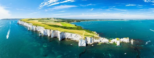 Panorama of White Cliffs of Old Harry Rocks Jurassic Coast from a drone, Dorset Coast, Poole,