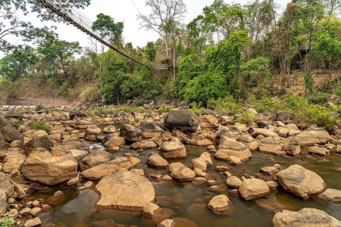 Suspension bridge over the Tad Lo River, Bolaven Plateau, Laos, Asia