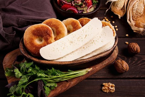 Mchadi, corn tortillas, traditional Georgian dish, corn bread, with Imeretian cheese, homemade, no