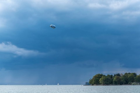 Moated castle, Lake Constance, Zeppelin, dinkle clouds, sailboats, forest, Bavaria, Germany, Europe