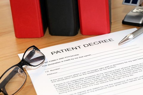 Symbolic image: Healthcare proxy, living will in English on a desk