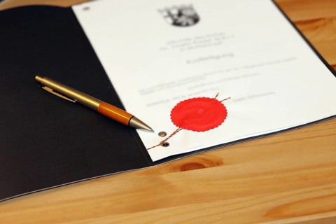Notarised contract with red official seal